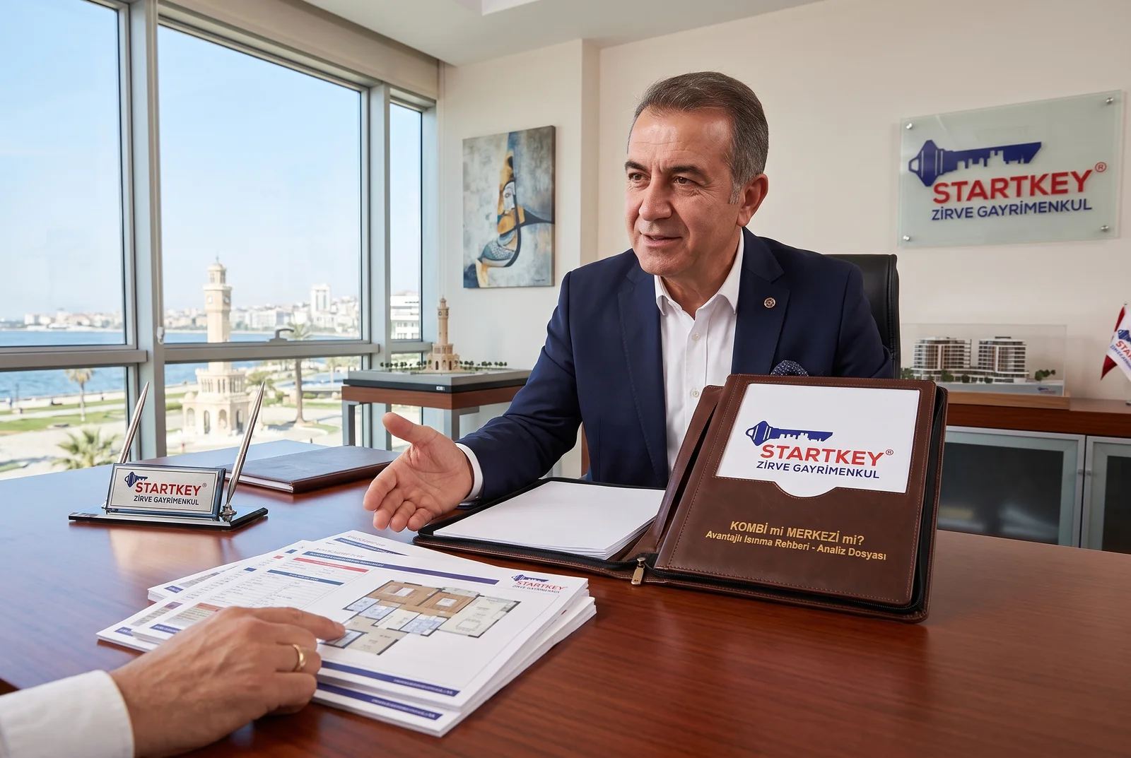 Startkey Zirve Gayrimenkul İzmir ofisinde Kombi mi Merkezi mi? Avantajlı Isınma Rehberi danışmanlık toplantısı